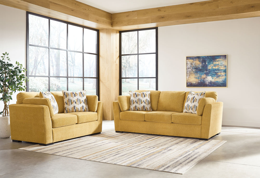 Keerwick - Living Room Set Yellow 2 Pc. Chair And A Half, Ottoman