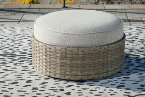 Calworth - Beige - Ottoman with Cushion